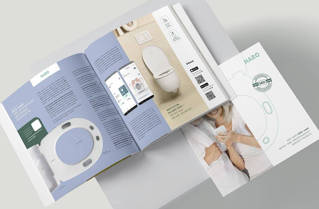 Ein Magazin zeigt den HARO EKG-seat mit App-Anbindung zur Gesundheitsüberwachung.